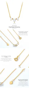 Macro detail of V-shaped gold S925 silver necklace with white shell pearls and zircons