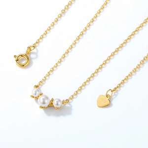 Minimalist S925 sterling silver gold necklace featuring three elegant white pearls