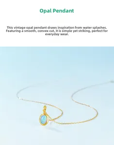 Detail of s925 silver gold plated necklace with oval cabochon opal pendant in water drop design