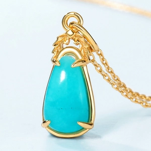 Elegant S925 silver necklace with leaf-shaped turquoise pendant and gold-plated chain