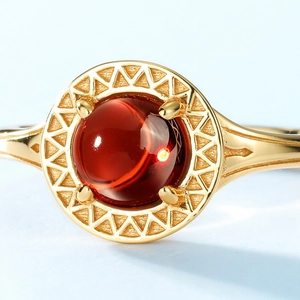 Retro S925 silver ring with red garnet stone on a light blue gradient background