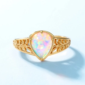 Minimalist S925 sterling silver ring with pear-cut opal and gold leaf texture
