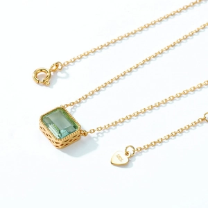 S925 sterling silver gold necklace with emerald-cut green crystal and heart tag