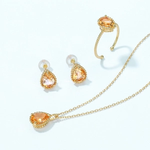 Elegant gold plated silver jewelry set with pear cut orange citrine drops