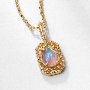 Collana vintage in argento S925 con motivo traforato e ciondolo in opale a goccia