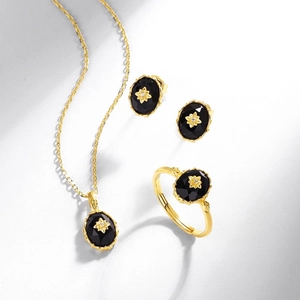 Vintage oval black onyx jewelry set with S925 sterling silver gold plated floral details