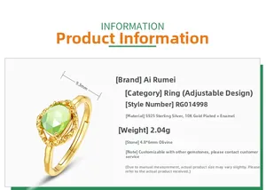 Macro shot of S925 sterling silver ring with 10K gold plating and peridot gemstone detail
