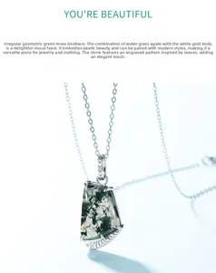 Detailed view of moss agate pendant with leaf engravings on silver plating