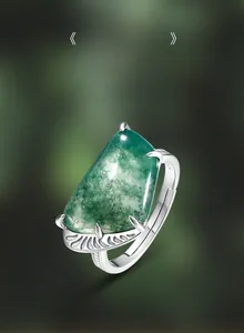 Macro shot of natural moss agate gemstone set in 925 sterling silver adjustable ring