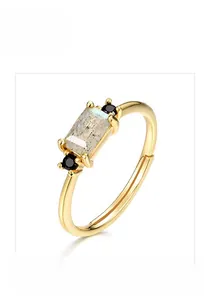 Macro shot of geometric labradorite ring in gold plated S925 silver with black side stones