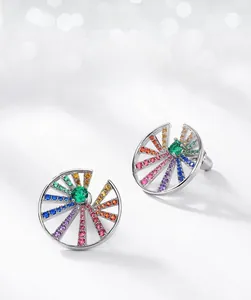 Macro shot of S925 silver fan-shaped earrings with colorful rainbow zircon stones
