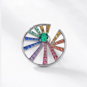 Detailed macro view of S925 silver earring with rainbow gemstone spiral design