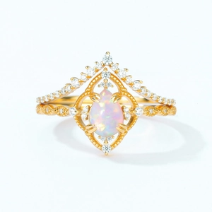 Anillo vintage de plata S925 bañada en oro con ópalo en forma de pera y destellos