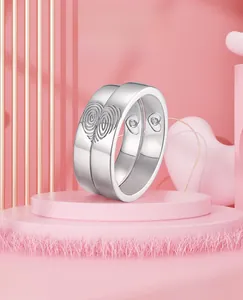 Detail of S925 silver fingerprint heart rings with inner diamond and 'The Imprint of Love'