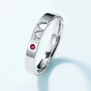 S925 sterling silver couple ring featuring a red gemstone and bird wing engraving
