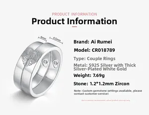 Detailed view of S925 sterling silver couple rings with fingerprint heart pattern and zircon