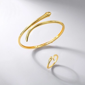 Ensemble bracelet et bague serpent minimaliste doré avec courbes élégantes et cristaux