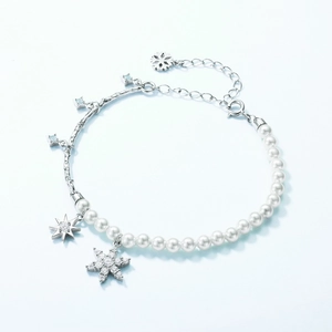 Elegant S925 silver snowflake bracelet with white pearls and sparkling zircon charms