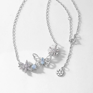 Elegant S925 sterling silver butterfly and snowflake pendant necklace with blue gemstone