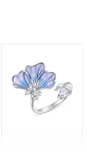Macro view of S925 silver ginkgo leaf ring with purple enamel and zircon stones