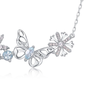 Elegant S925 sterling silver butterfly and snowflake necklace with light blue gem inlay
