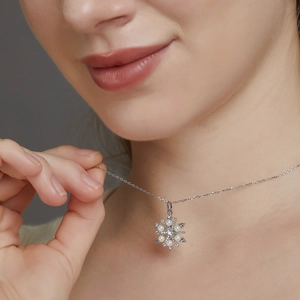 Elegant 925 silver snowflake necklace with a central diamond and pearl pendant for women