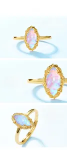 Macro shot of the marquise-cut opal stone and vintage leaf pattern on s925 silver ring