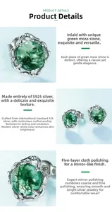 Detail of S925 sterling silver earrings with green moss agate in flower prong setting
