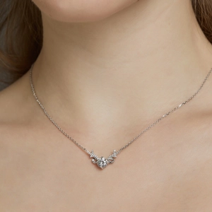 Elegant S925 sterling silver reindeer necklace with moissanite on a model's neck