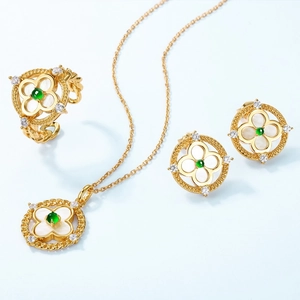 S925 silver four-leaf clover jewelry set with emerald green stones and white shell inlay