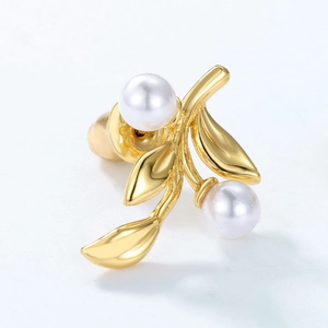 S925 sterling silver pearl earrings with golden branch and leaf design on white background