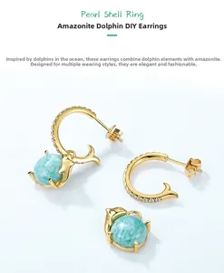 Detail of dolphin earrings with amazonite stones and gold plating in a modular DIY design