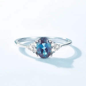 Elegant S925 silver ring with oval alexandrite stone and side zircon accents