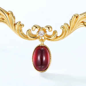 Vintage S925 silver gold-plated necklace with oval red garnet and baroque filigree