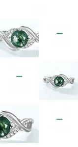 Macro shot of S925 sterling silver ring with polished moss agate stone and side gems