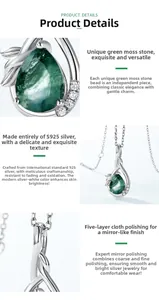 Close-up of teardrop moss agate pendant in S925 sterling silver with zircon accents