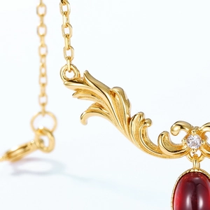 Vintage S925 silver gold-plated necklace with oval garnet pendant and zircon accents