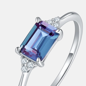 Elegant 925 silver alexandrite ring with emerald cut gemstone and side diamonds