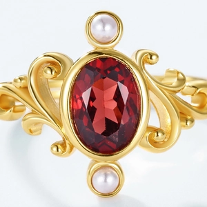 Vintage palace style S925 silver ring with oval red gemstone and white pearl accents