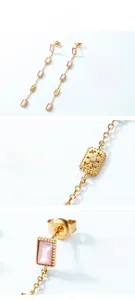 Detail showing S925 sterling silver stamp and pink shell texture on long drop earrings