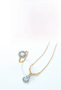 Detailed macro view of S925 gilded silver pendant with rectangular sky blue topaz
