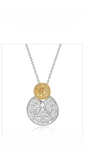 Detail of two-tone coin pendant necklace with embossed heraldic crest on 925 silver chain