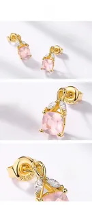 Vue détaillée des boucles d'oreilles en argent S925 avec cristaux roses naturels