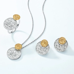 Vintage relief coin jewelry set with silver and gold tones including necklace and ring