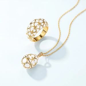 Elegant Faberge style S925 silver jewelry set with white enamel and crystals