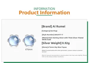 Détail de boucles d'oreilles fleur en argent S925 avec topaze bleue ronde de 6mm