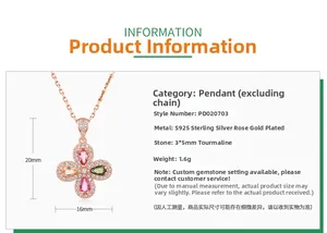Detail of S925 silver four leaf clover pendant with pink and green tourmaline stones