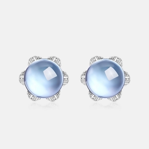 Boucles d'oreilles fleurs en argent 925 avec topaze bleue naturelle et fini poli