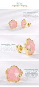 Macro detail of 925 silver pink crystal flower earrings with multi-layer gold plating
