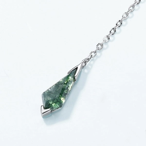 Macro shot of geometric moss agate pendant with polished S925 sterling silver chain